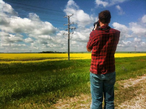 Mike taking a road side photo - The Hills of Saskatchewan